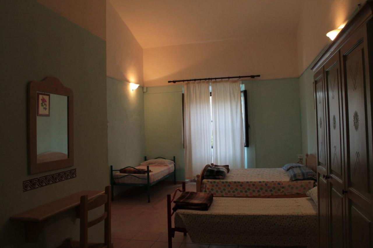 Agriturismo E Antica Fattoria Matteu Bed & Breakfast Teulada Bagian luar foto